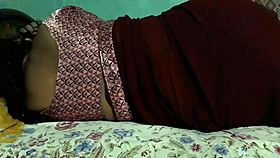 Maroon saree clad Sanjana aunty exposing her butt with allure