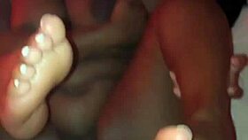 Thick ebony with big natural tits and pretty toes gets fucked by bbc in a homemade video.