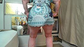 Fingers only in green caged panties.