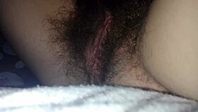 quick masturbation in bed, hairy pussy close up with big clit orgasm