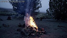 In this fantasy cosplay, the bare maiden MASTURBATES by the CAMPFIRE all alone, showing off her small tits in public