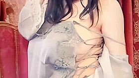 asian milf in blue satin on webcam