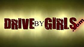 blonde fashion model participates in a public group event through a car window