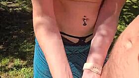 Wife gives quick handjob with pierced nipples while out on a public walk