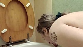 Oh, what a humiliated slut! She licks the toilet in bondage humiliation.