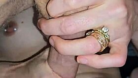 Glove-wearing milf milks cock with her mouth while wearing a thong 😏