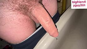 Man with big hairy cock pissing and moaning in dirty homemade clip
