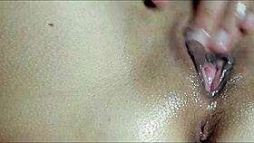 He massages my pussy with oil until I cum