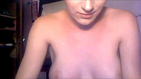 Stunning shemale with short hair performs on webcam.