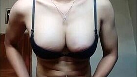 This amateur shemale in black bra and stockings is cumming on a handkerchief.