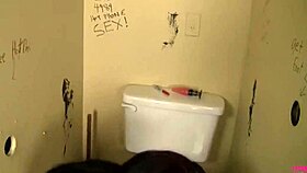 Enchanting Angelica jerks big cock on toilet