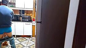 in the kitchen, the wife moans with her lover