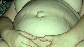 This milf is playing with her soft and cumming