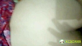 fucking my wife doggystyle, she bends over as i cum on the condom.