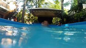 Melissa the mermaid with tattoo in pool