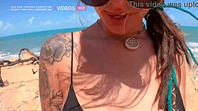 Couple fucks bent over on Morro Branco facing the sea.