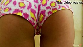 Kinky blonde teen Faby O stimulates her wet pussy with the handheld shower in the bathroom.