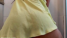 Brazilian married woman uses a vibrator in a solo close-up video, showcasing her small waist and big ass in a softcore amateur setting