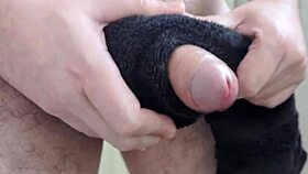 Amateur solo guy feels real towel in bathroom close up