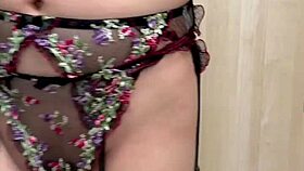 The serious-looking girl in uniform tries on embarrassing lingerie for clitoris and anal training.