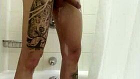 Intense bath session escalates with groping touches turning into a steamy handjob climax.