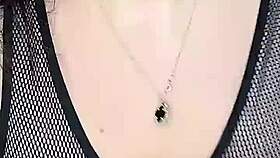 She fucks those huge natural tits in stockings on the mesh!