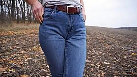 Milf Teases Her Big Cameltoe in Blue Jeans Outdoors