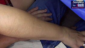 Cute student gives risky handjob to classmate under table during lesson