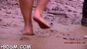 Clamped babe's wet pussy and cunt get pounded with toys while bound