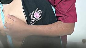 Tailor Measures Hijab Lady