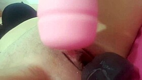masturbating my big pussy with a fat toy and a massager on my swollen