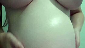 pregnant milf in lingerie gets natural tits massage