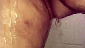 I play with toys in the shower, getting wet and horny.