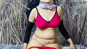 in this homemade video, a poor indian girl strips nude, showing her big tits and ass