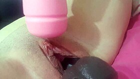 masturbating my big pussy with a fat toy and a massager on my swollen