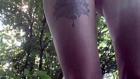 woman pees through bikini pants outdoors in public