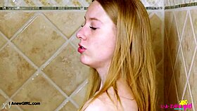 bright-eyed blonde enjoys a relaxing shower