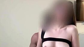 Oriental hottie gets big load of cum on het titties.