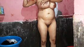 Step sister in law is bathing and washing her big boobs 😍