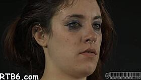 latex couple explores tight oral and licking in intimate sadomasochism setting