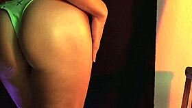 Oiled MILF model seduced by Asian lesbian