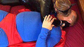 Catgranny sucking Superman's cock, or is it the other way?