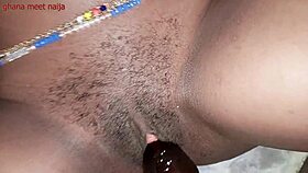 An ebony Ghana girl with onion booty fucks a malt bottle