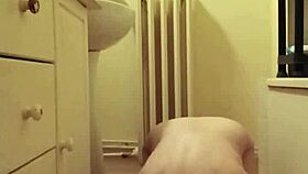 sexy slave in chains enjoys self-pleasure and orgasm