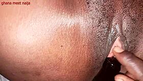 An ebony Ghana girl with onion booty fucks a malt bottle