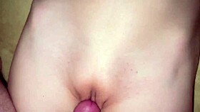 He fucks the pink pussy hard in a homemade scene, stretching it with his big cock.