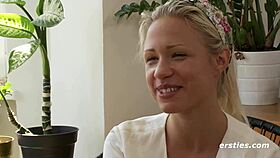 Intriguing blonde babe masturbates intimately with vibrator in bedroom close-up