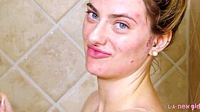 gorgeous blonde enjoys relaxing shower