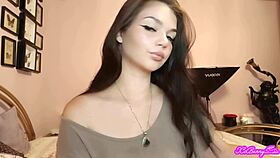 Xo bunny, the brunette Latina with blue eyes, smokes and blows smoke in your face