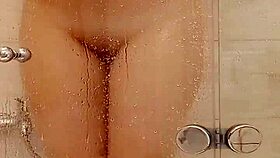 She caresses herself in the bath 😊